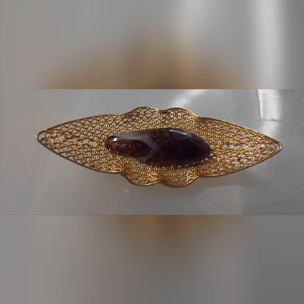 Elegant Gold and Purple Brooch